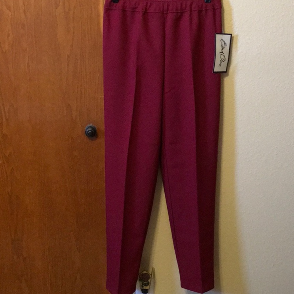 Bend over burgundy pants.